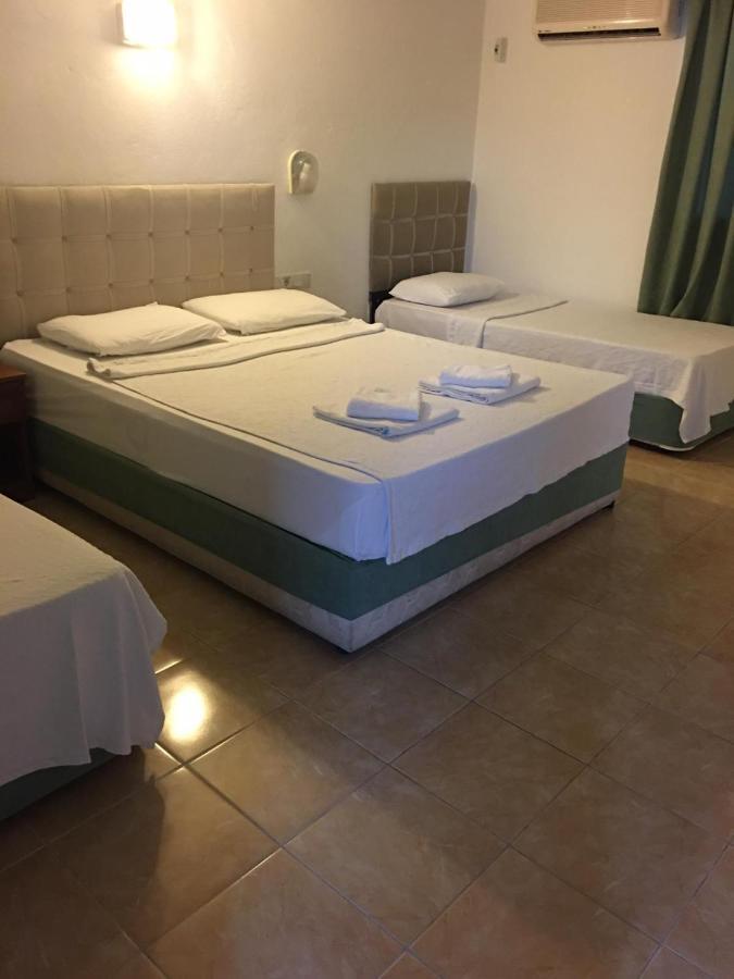 Ugur Beach Hotel Kemer Bagian luar foto